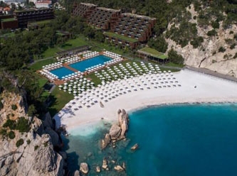 Bakan Ersoy otelinde plajı güzel göstermek için mermer tozu kullanıldığını itiraf etti