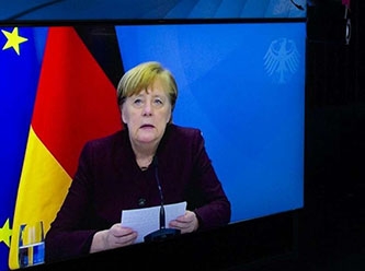 Merkel’in Prof. Şahin’i övgüsü Davos’a damga vurdu