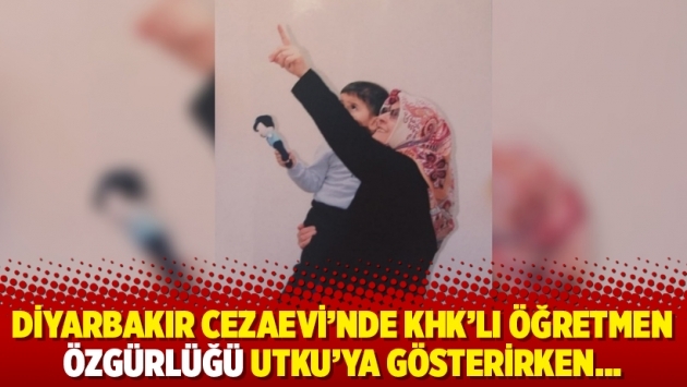 Diyarbakır Cezaevi’nde KHK’lı öğretmen özgürlüğü Utku’ya gösterirken…