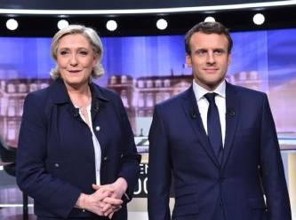 Macron ile ırkçı Le Pen arasından 'Başörtüsü yasağı' polemiği