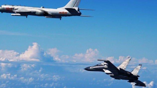 Rus ve Çin savaş uçaklarından Biden'a gövde gösterisi