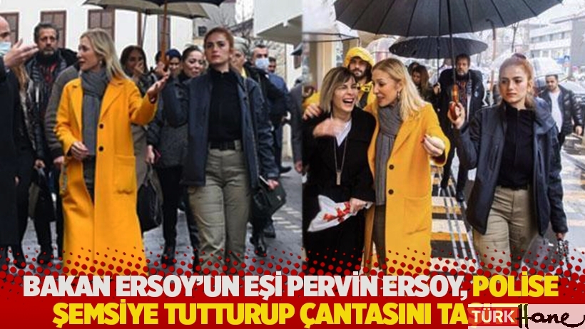 Bakan Ersoy'un eşi Pervin Ersoy, polise şemsiye tutturup çantasını taşıttı