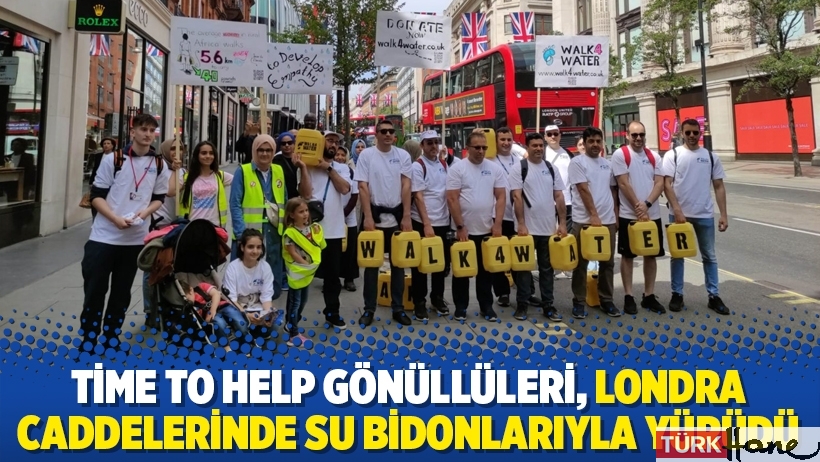 Time to Help gönüllüleri, Londra caddelerinde su bidonlarıyla yürüdü